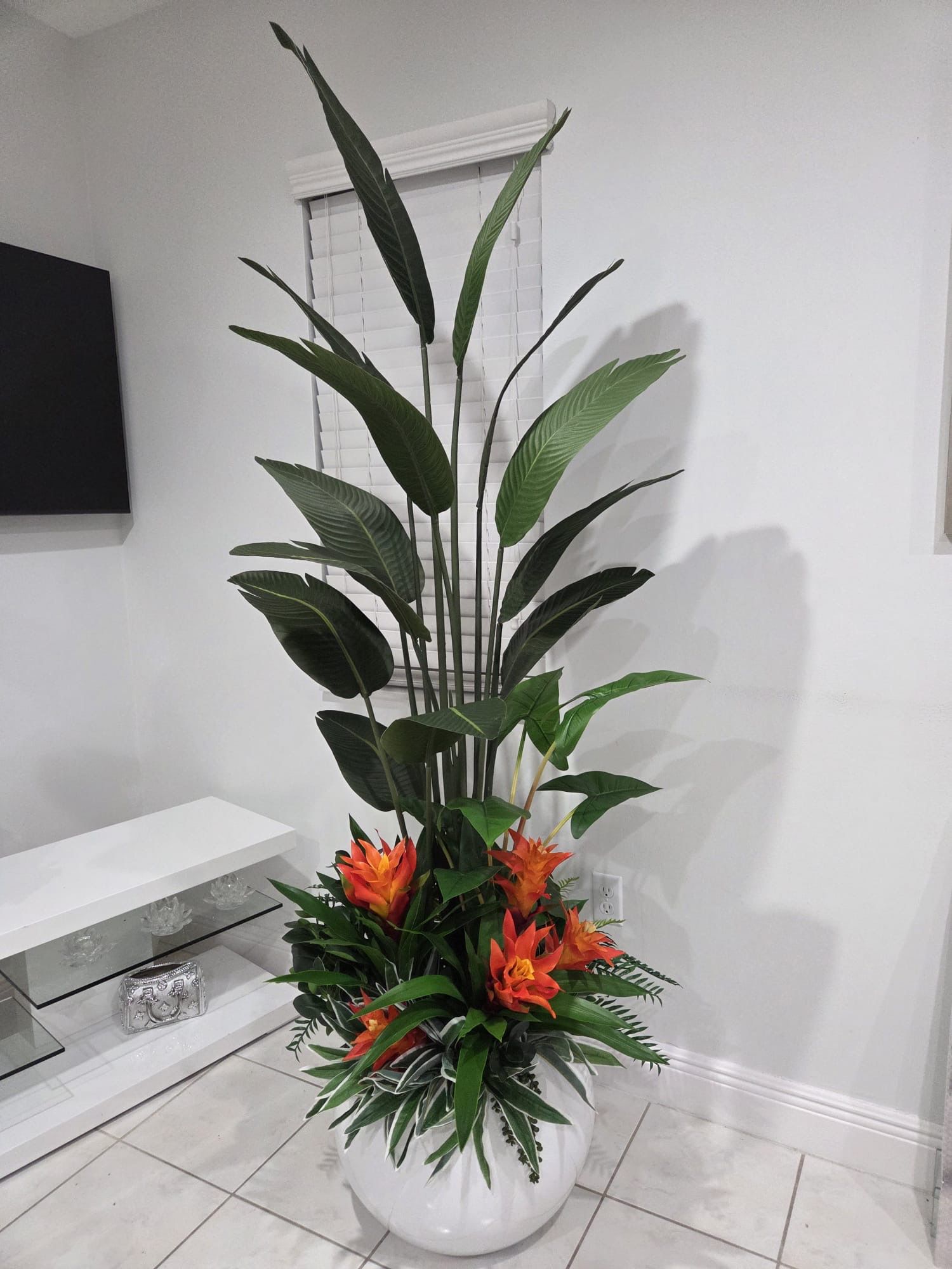 FLORAL ARRANGEMENT ORANGE GUZMANIA/WHITE VASE