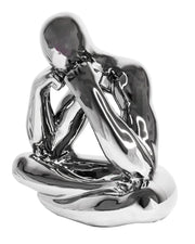 PENSIVE THINKING TABLETOP SCULPTURE.
