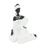 SITTING AFRICAN SCULPTURE