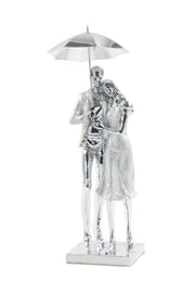 COUPLE UNDER UMBRELLA SCULPTURE