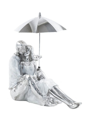 SITTING COUPLE W/ UMBRELLA SCULPTURE