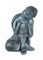 SLEEPING SILVER BUDDHA SCULPTURE.