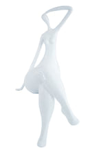 ON EDGE WOMAN SCULPTURE