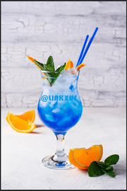 BLUE COCKTAIL DRINK WITH ICE AND ORANGE